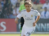 Real's Luca Modric in action during a friendly match against Everton on August 3, 2013