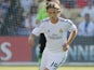 Real's Luca Modric in action during a friendly match against Everton on August 3, 2013