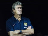Manchester City manager Manuel Pellegrini on the touchline during a friendly match against Sunderland on July 27, 2013