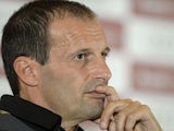 Milan's Massimiliano Allegri at a press conference on July 30, 2013