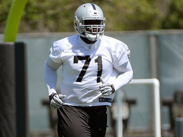Menelik Watson #71 of the Oakland Raiders participates in drills during Rookie Mini-Camp on May 11, 2013