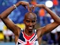 Mo Farah celebrates after winning gold in the Men's 10000 metres final at the World Athletics Championships in Moscow on August 10, 2013