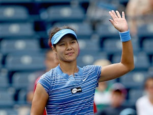 Na Li celebrates her win over Ana Ivanovic during the Rogers Cup on August 8, 2013