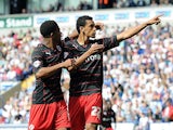 Reading's Nick Blackman is congratulated by team mate Gareth McCleary after scoring the equaliser against Bolton on August 10, 2013