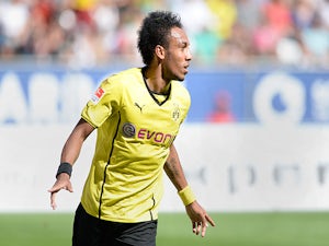 Borussia Dortmund's Pierre-Emerick Aubameyang celebrates after scoring the opening goal against Augsburg on August 10, 2013