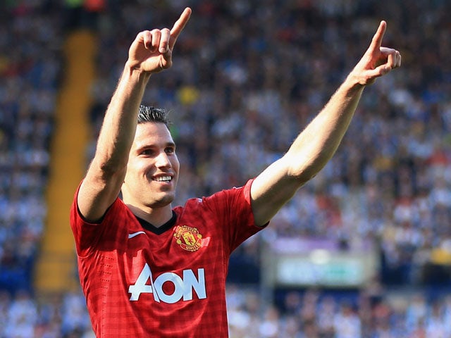 Robin van Persie of Manchester United celebrates as he scores their fourth goal during the Barclays Premier League match between West Bromwich Albion and Manchester United on May 19, 2013