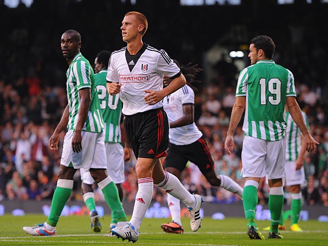 Fulham's Steve Sidwell celebrates after scoring the opening goal against Real Betis during a friendly match on August 5, 2013
