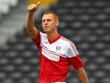 Fulham's Steve Sidwell celebrates after scoring the opening goal against Parma during a friendly match on August 10, 2013