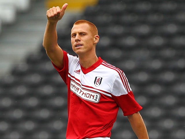 Fulham's Steve Sidwell celebrates after scoring the opening goal against Parma during a friendly match on August 10, 2013