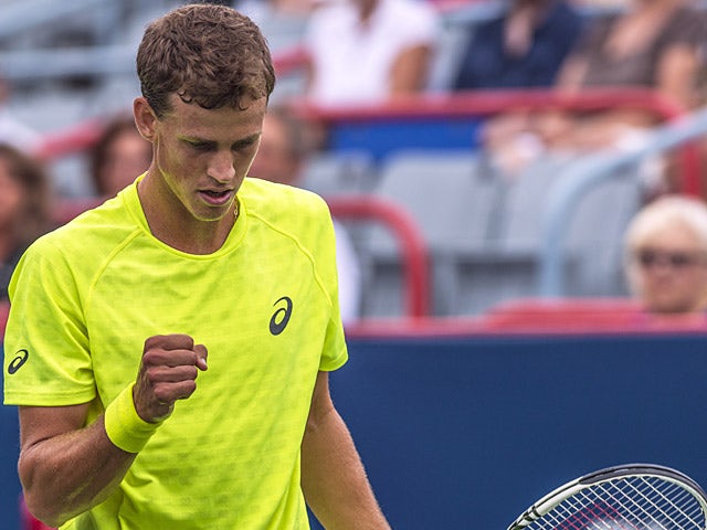 Vasek Pospisil celebrates a point against Nikolay Davydenko in their quarter final match during the Rogers Cup on August 9, 2013