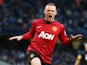 Wayne Rooney of Manchester United celebrates the winning goal during the Barclays Premier League match between Manchester City and Manchester United on December 9, 2012
