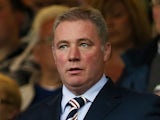 Rangers manager Ally McCoist looks on from the stand during the pre season friendly match between Rangers and Newcastle United at Ibrox Stadium on August 06, 2013