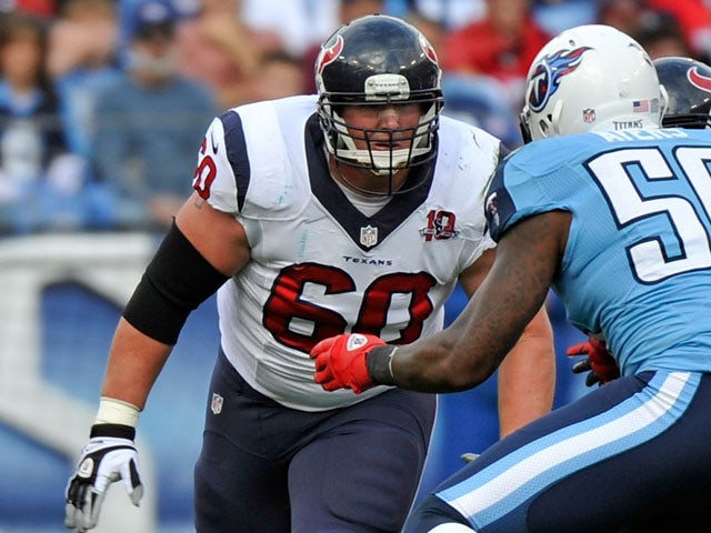 Ben Jones #60 of the Houston Texans plays against the Tennessee Titans at LP Field on December 2, 2012