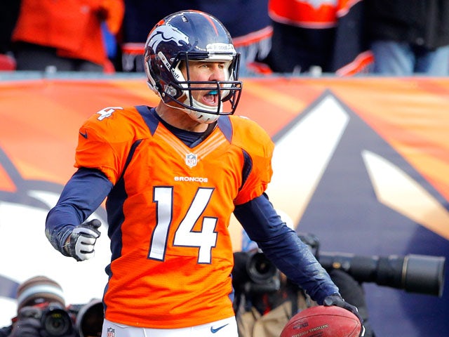 Brandon Stokley of the Denver Broncos reacts after he scored a 15-yard touchdown reception in the first quarter against the Baltimore Ravens during the AFC Divisional Playoff Game at Sports Authority Field at Mile High on January 12, 2013