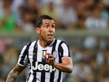 Juventus' Carlos Tevez in action during a friendly match against AC Milan on July 23, 2013