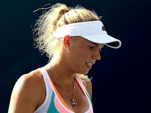 Wozniacki booted out in Sydney