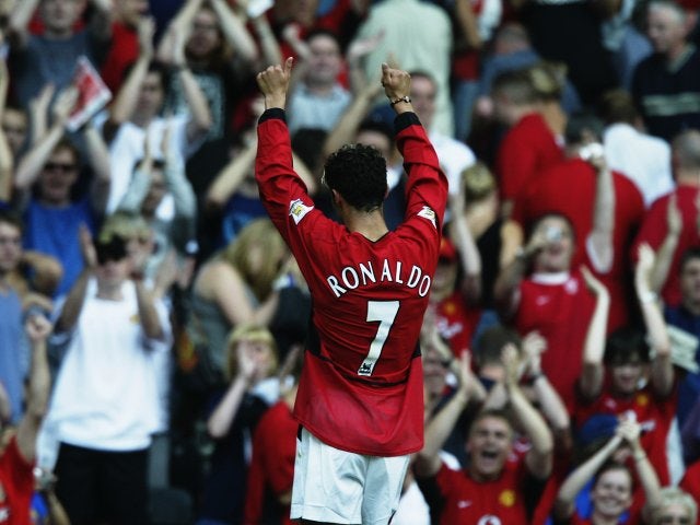 Cristiano Ronaldo applauds the Manchester United crowd after his debut.