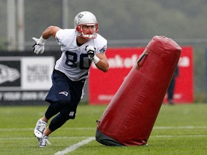 Danny Amendola #80 completes a drill during the first day of New England Patriots Training Camp at Gillette Stadium on July 26, 2013