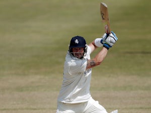 Kent cricketer charged in corruption probe