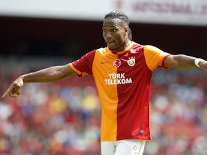 Galatasaray's Ivorian striker Didier Drogba gestures during the pre-season friendly football match between Galatasaray and FC Porto at The Emirates Stadium in north London on August 3, 2013
