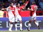 Monaco's Emmanuel Riviere is congratulated by team mates Radamel Falcao and Jeremy Toulalan after scoring his team's second goal against Montpellier on August 18, 2013