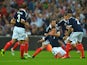 James Morrison of Scotland celebrates with team-mates after scoring a goal during the International Friendly match between England and Scotland at Wembley Stadium on August 14, 2013