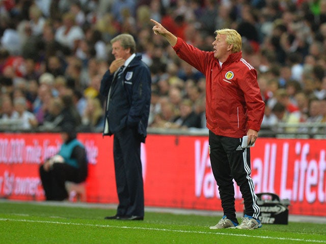 Scotland manager Gordon Strachan shouts from the touchline during the international friendly football match between England and Scotland at Wembley Stadium in London on August 14, 2013
