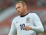 England striker Wayne Rooney plays during the international friendly football match between England and Scotland at Wembley Stadium in London on August 14, 2013