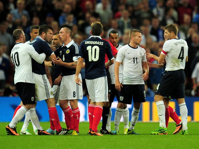 England and Scotland players confront each other during the International Friendly match between England and Scotland at Wembley Stadium on August 14, 2013