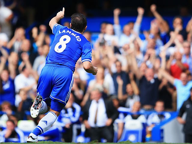 Chelsea's Frank Lampard celebrates after scoring a free kick against Hull on August 18, 2013