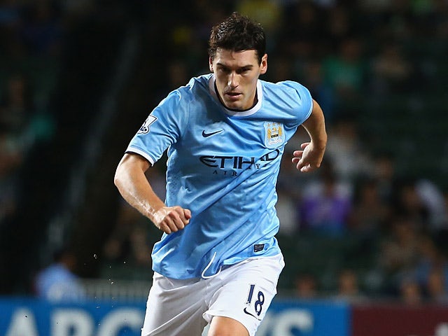 Mancester City's Gareth Barry in action against Sunderland during a friendly match on July 27, 2013