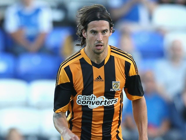 George Boyd of Hull City runs with the ball during the pre season friendly match between Peterborough United and Hull City at London Road Stadium on July 29, 2013
