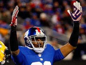 Wide receiver Hakeem Nicks #88 of the New York Giants reacts after scoring a touchdown in the third quarter against the Green Bay Packers at MetLife Stadium on November 25, 2012