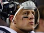 J.J. Watt #99 of the Houston Texans looks on from the sidelines against the New England Patriots during the 2013 AFC Divisional Playoffs game at Gillette Stadium on January 13, 2013