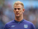 Hart of Manchester City looks on during the Barclays Premier League match between Manchester City and Norwich City at Etihad Stadium on May 19, 2013