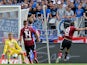 Nuremberg's Josip Drmic scores his team's opening goal against Hertha Berlin on August 18, 2013