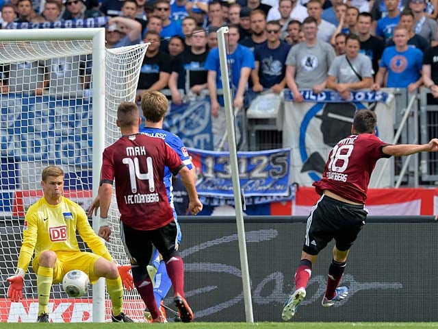 Nuremberg's Josip Drmic scores his team's opening goal against Hertha Berlin on August 18, 2013