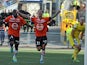 Lorient's Jeremie Aliadiere celebrates after scoring his team's second goal against Nantes on August 18, 2013