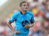 Spurs' Michael Dawson in action against Colchester during a friendly match on July 19, 2013