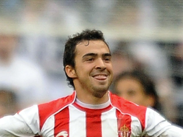 Miguel de las Cuevas playing for Sporting Gijon on April 2, 2011