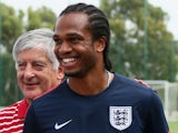 Nathan Delfouneso and FA Chairman David Bernstein attend an England training with local school children on June 9, 2013