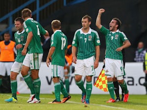 Martin Paterson of Northern Ireland celebrates after scoring the opening goal during the FIFA 2014 World Cup Group F Qualifier match between Northern Ireland and Russia at Windsor Park on August 14, 2013