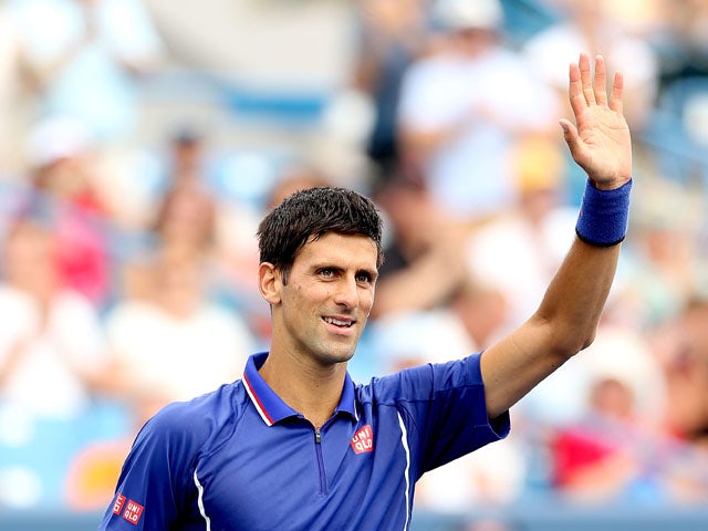Novak Djokovic of Serbia acknowledges the crowd after his win over David Goffin of Belgium during the Western & Southern Open on August 15, 2013