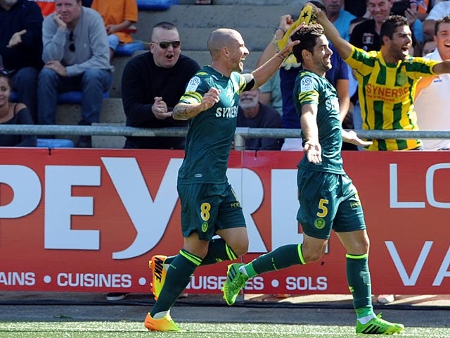 Nantes' Olivier Veigneau celebrates after scoring the opening goal against Lorient on August 18, 2013