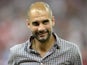 Bayern Munich's Spanish headcoach Pep Guardiola looks ahead during the awarding ceremony of the Audi Cup after the football match Bayern Munich FC vs Manchester City in Munich on August 1, 2013