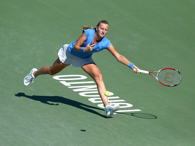 Petra Kvitova of the Caech Republic hits a return during her 6-4, 5-7,2-6 loss to Sorana Cirstea of Romania during the Rogers Cup Toronto on day 5 at Rexall Centre at York University on August 9, 2013