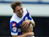 Tom Hitchcock and Clint Hill of QPR celebrate victory at the final whistle during the Sky Bet Championship match between Queens Park Rangers and Ipswich Town at Loftus Road on August 17, 2013
