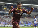 Marco Faraoni of Watford celebrates after scoring the teams first goal during the Sky Bet Championship match between Reading v Watford at The Madejski Stadium on August 17, 2013
