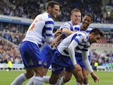 Jem Karacan of Reading celebrates with team mates after scoring the teams second goal during the Sky Bet Championship match between Reading v Watford at The Madejski Stadium on August 17, 2013
