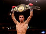 Scott Quigg celebrates his victory over Rendell Munroe during their Super Bantamweight bout at the MEN Arena on November 24, 2012
